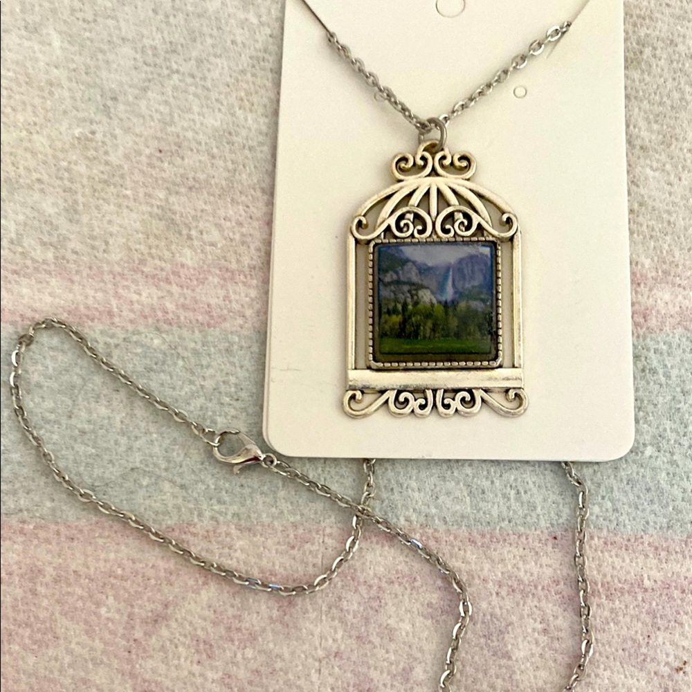 Silver Pendant Necklace with Scenic Waterfall Design